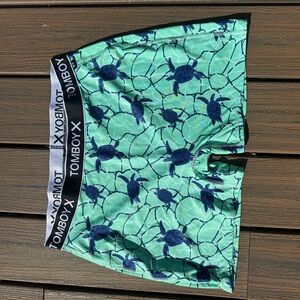 Size XL Tomboy X Swim shorts with turtles